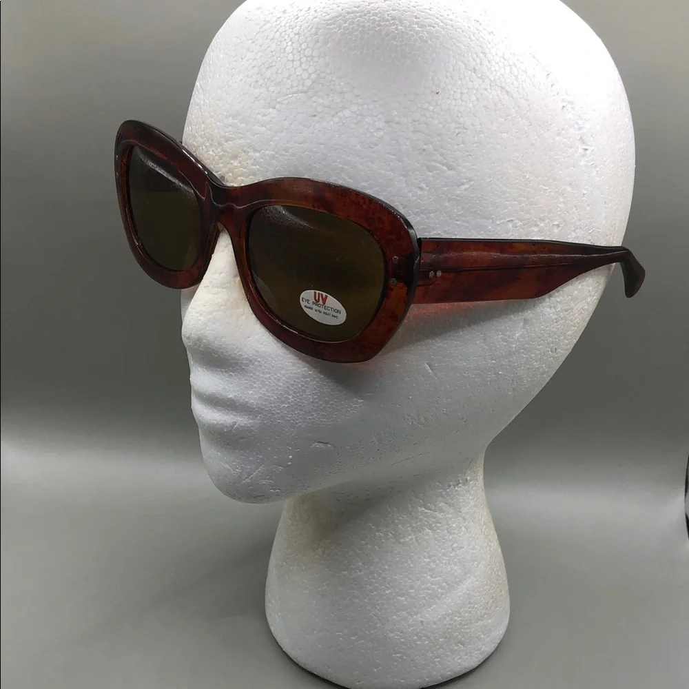 Vintage 80's 90's brown amber color semi oversized butterfly sunglasses.